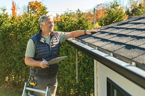 Professional Storm Damage Roof Repair technician working in Reading, PA